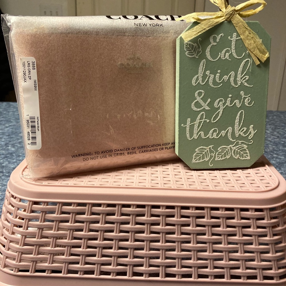 Coach Large corner zip blush wristlet in original wrapping.new
